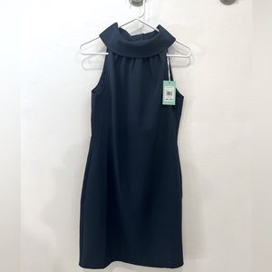 New Sail to Sable Navy Sheath Dress buttons down back. Work, event, date night!